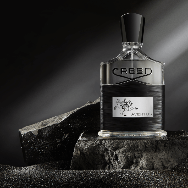 Creed men's fragrance bottle on a dark background
The Style Hub
